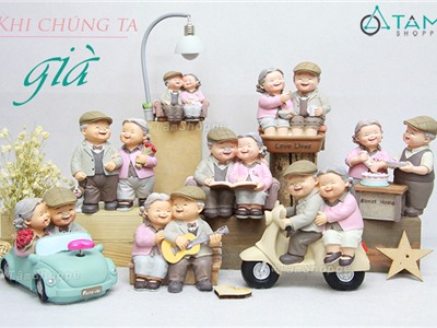 Tượng ông bà anh hạnh phúc nhiều kiểu áo hồng CO-TOBHP-01